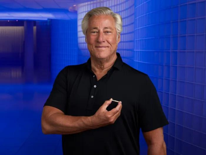 Irwin holds a small pacemaker