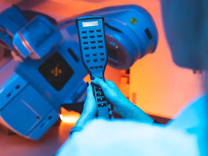 radiation technology in cool lighting setting dark blue orange red hues 