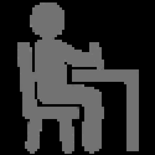 Person writing at desk