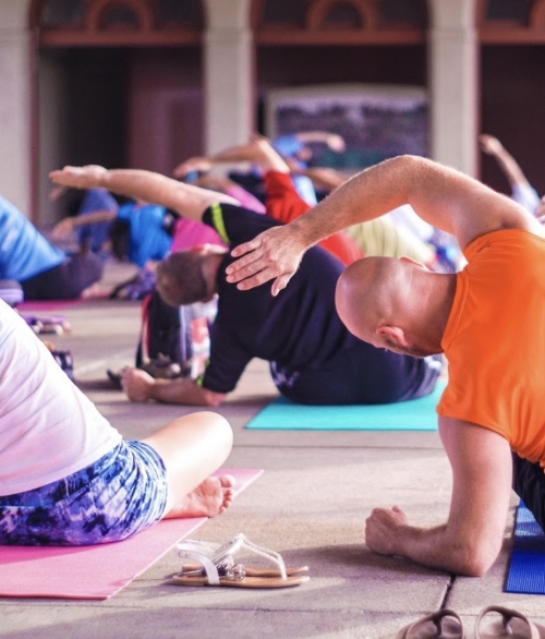 Group of people doing yoga