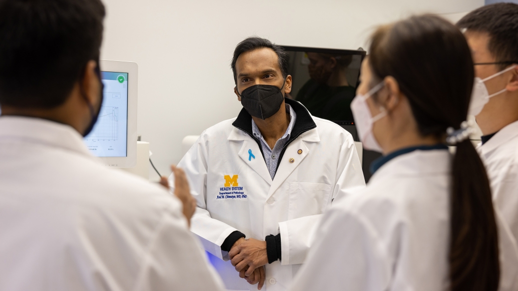 Dr. Chinnaiyan in the lab with colleagues.