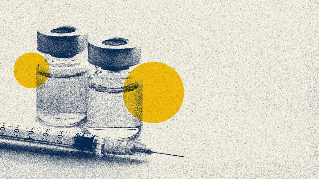 Vials in blue and yellow with syringe