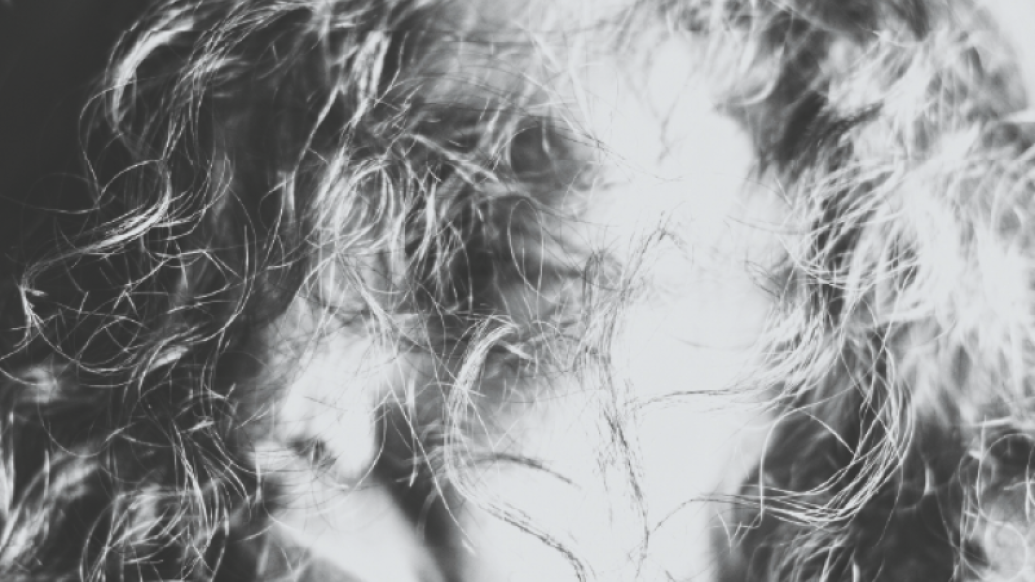 close-up of woman's face in black and white