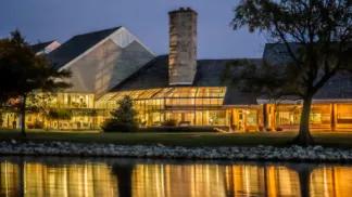 Photo of the lodge building at dusk