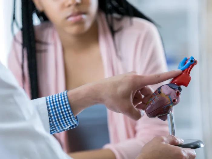 girl looking with medical employee