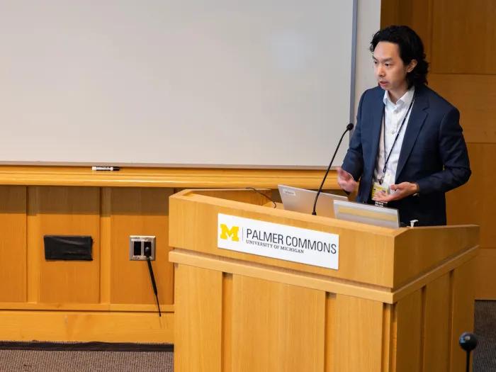 speaker at palmer commons on research day 