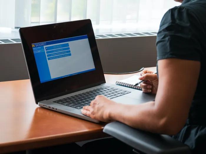 Phot of a person looking at DataDirect on their computer
