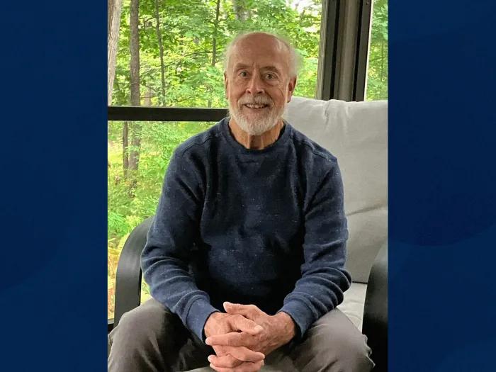 man smiling sitting
