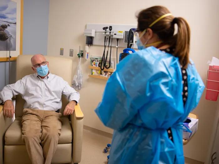 doctor speaking with patient