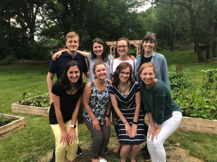 Med Peds class of 2022 smile for a photo outside