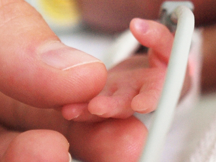 mother holding hand