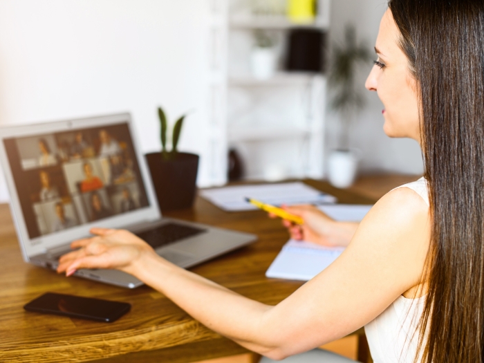 A woman participating in a zoom event