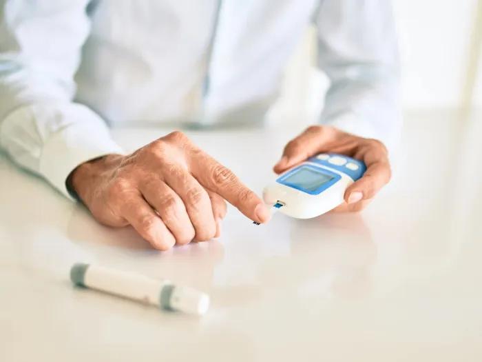person testing for insulin
