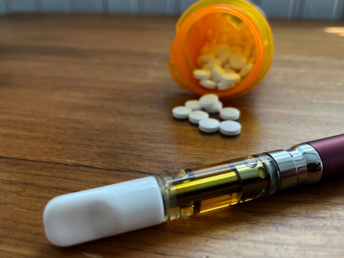 pills spilling out of bottle 