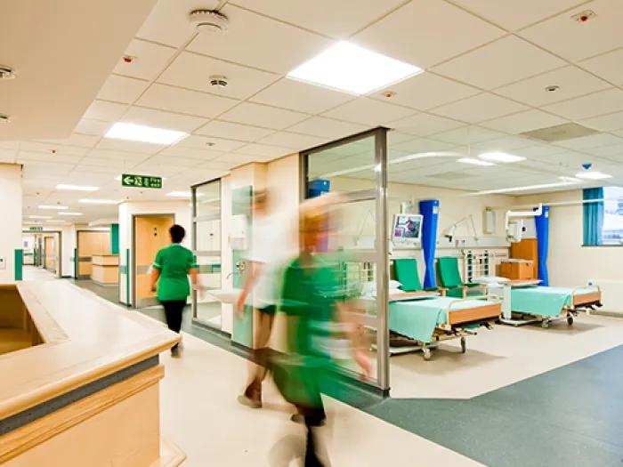 Person walking quickly through the hospital