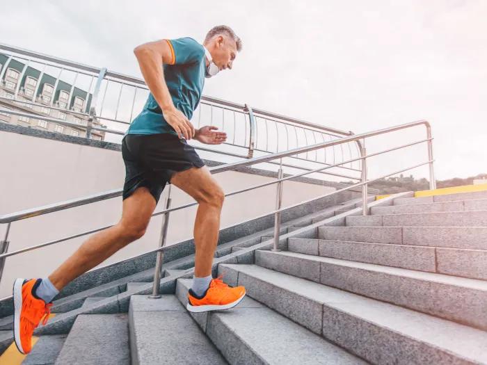 a man running up stairs