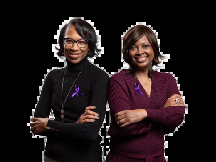 Two Lupus Survivors smile facing the camera