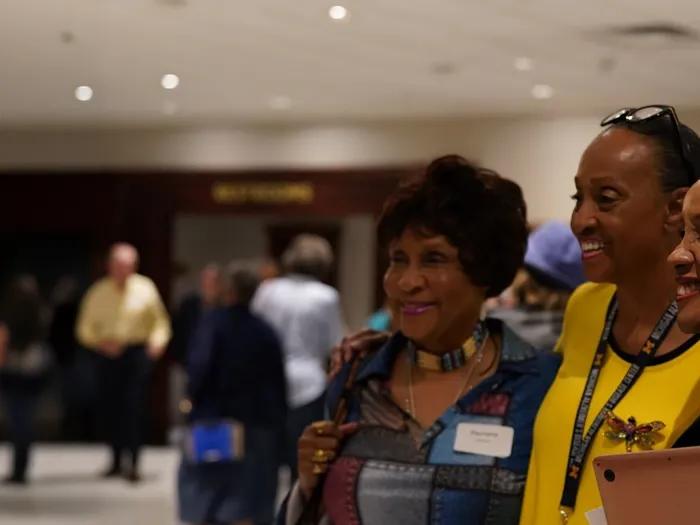 three woman at an event