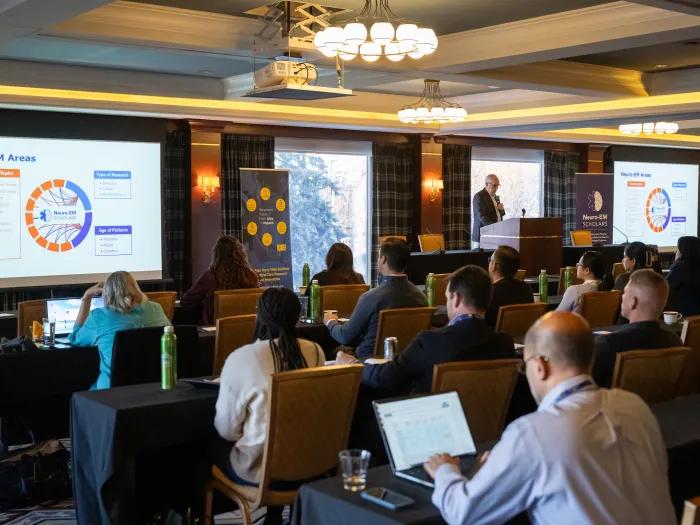 Dr. Robert Neumar speaks before attendees at the inaugural Neuro-EM Scholars K12 Retreat.