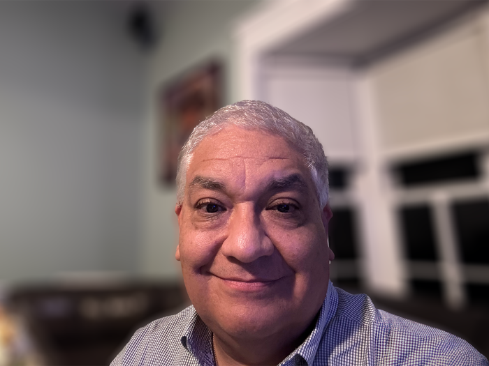 Smiling headshot of Juan Alejos, M.D.