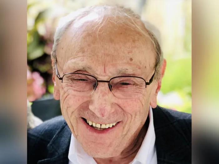 Smiling portrait of Alvin Michaels, M.D.
