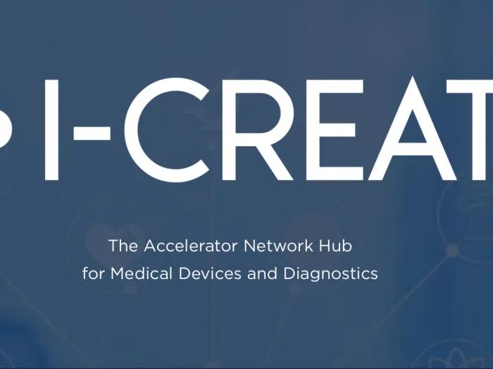 I-CREATE logo in white displayed on a blue background