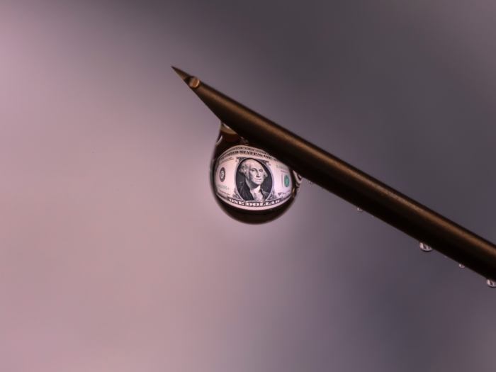 water droplet with money in it