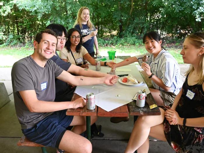 Residents gather around at the Welcome Picnic