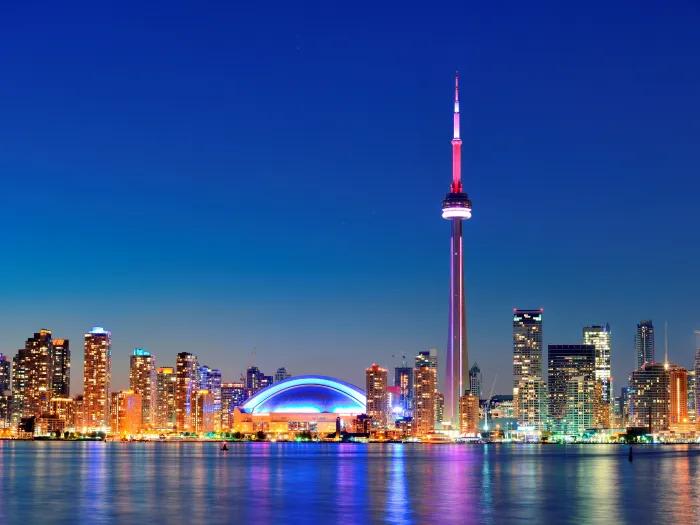 a sunset image of the toronto skyline