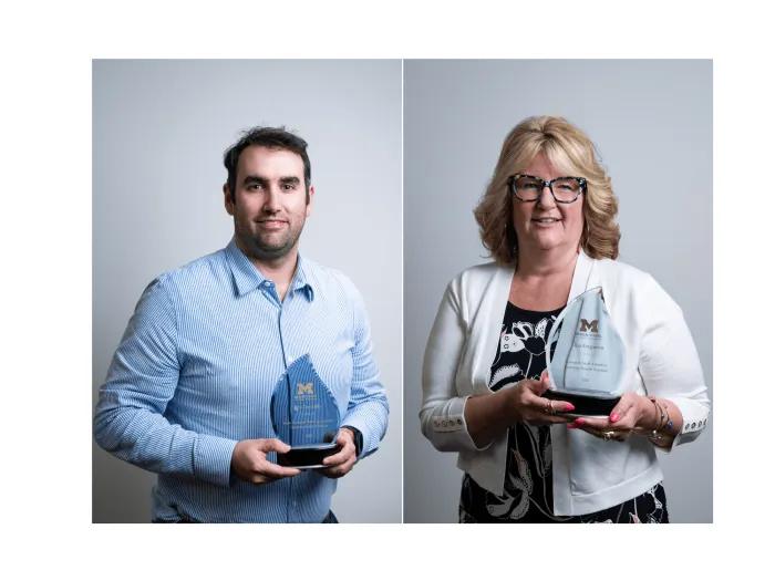 John Donnelly (L) and Lisa Ferguson (R) holding awards