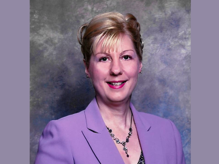 Brenda Franklin in purple suit
