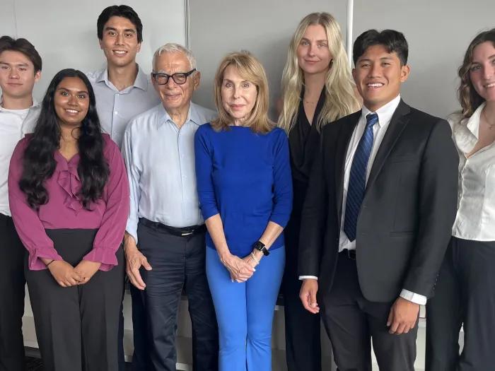 Joel and Shelley Tauber with the 2025 Tauber Family Interns