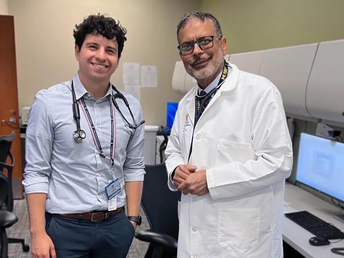 medical student with attending in white coat