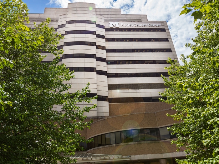 Rogel Cancer Center through trees