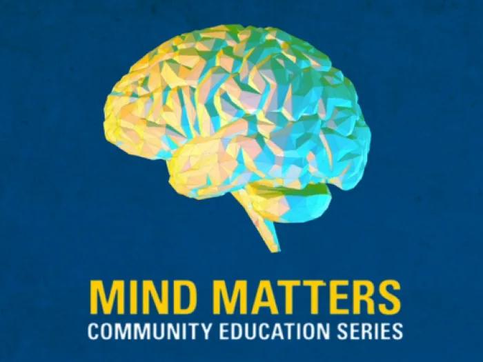Geometric, multicolored illustration of a human brain against a blue background. Below the brain, large yellow text reads "Mind Matters," and smaller white text underneath says "Community Education Series."