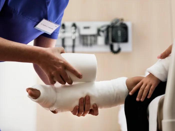 Child gets a leg cast put on