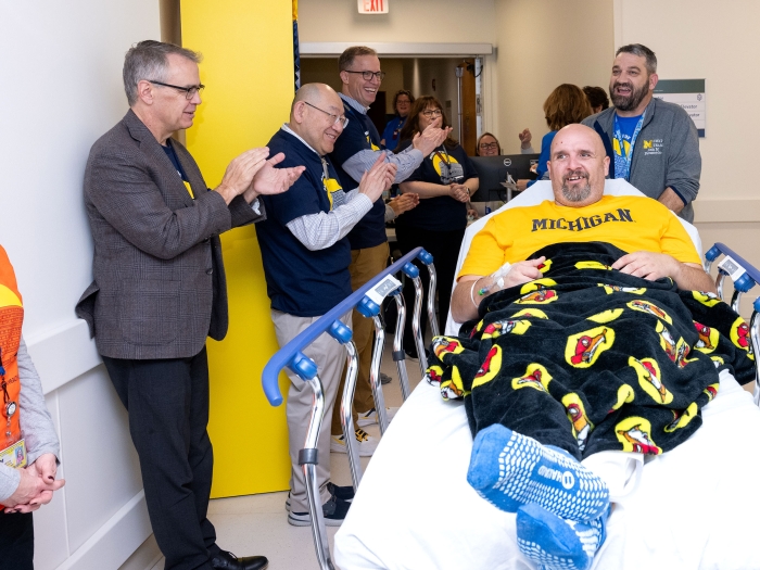 Craig Campbell moved to his new bed in the D. Dan and Betty Kahn Health Care Pavilion