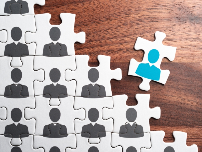 Puzzle pieces of stock anonymous figure