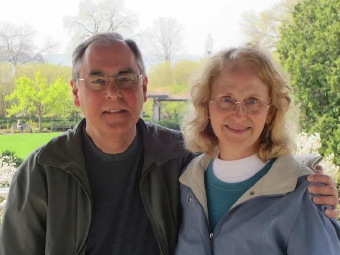 a man and woman smiling 