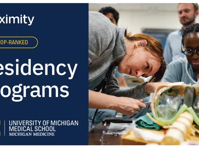 Residents working in the simulation center with text detailing that the U-M Medical School has 20+ top residency programs in this year's Doximity rankings. 