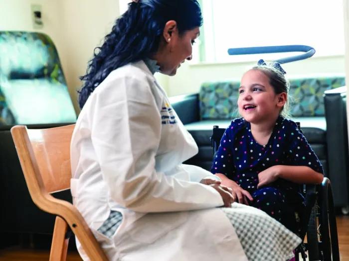 Neena Marupudi and young patient