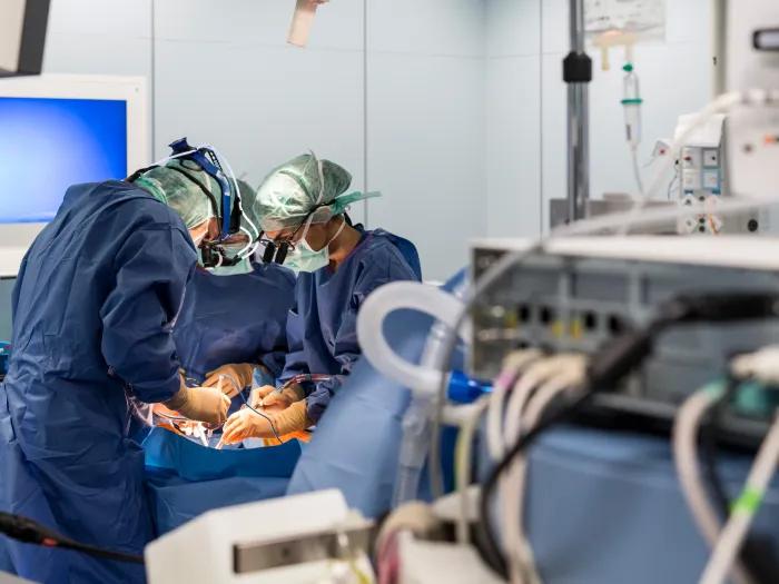 surgeons in surgery operating room 