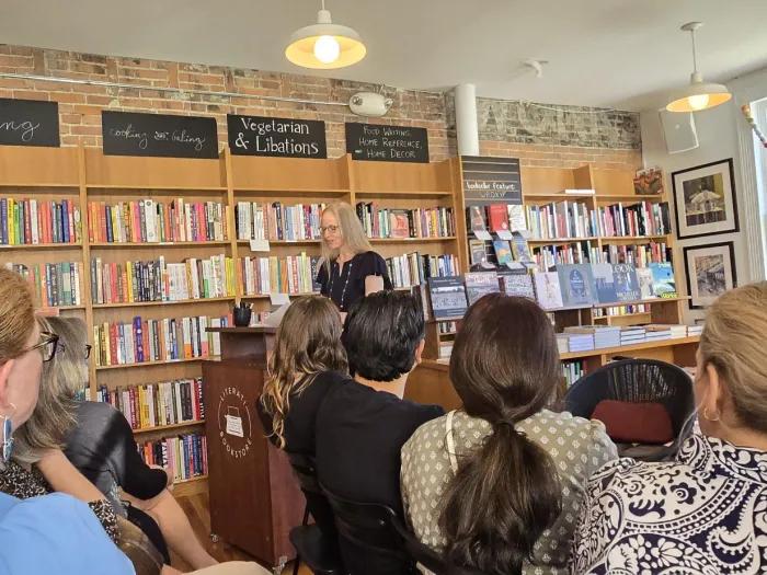 Dr. Kara Zivin reads from her memoir Persevered at the launch event at Literati Bookstore in Ann Arbor