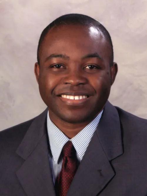 Dr. Arnold Etame