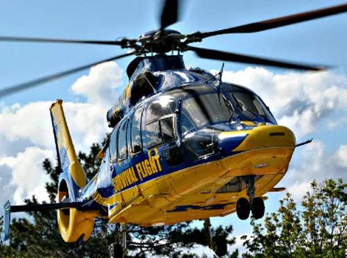 Helicopter flying in air preparing to land