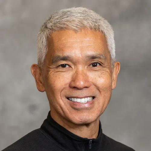 headshot of Roland Kwok