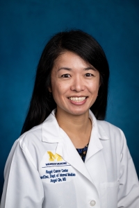 A professional headshot of Dr. Angel Qin