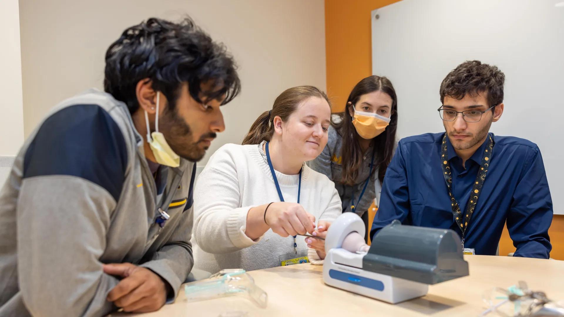 students perform a classroom lab simulation.
