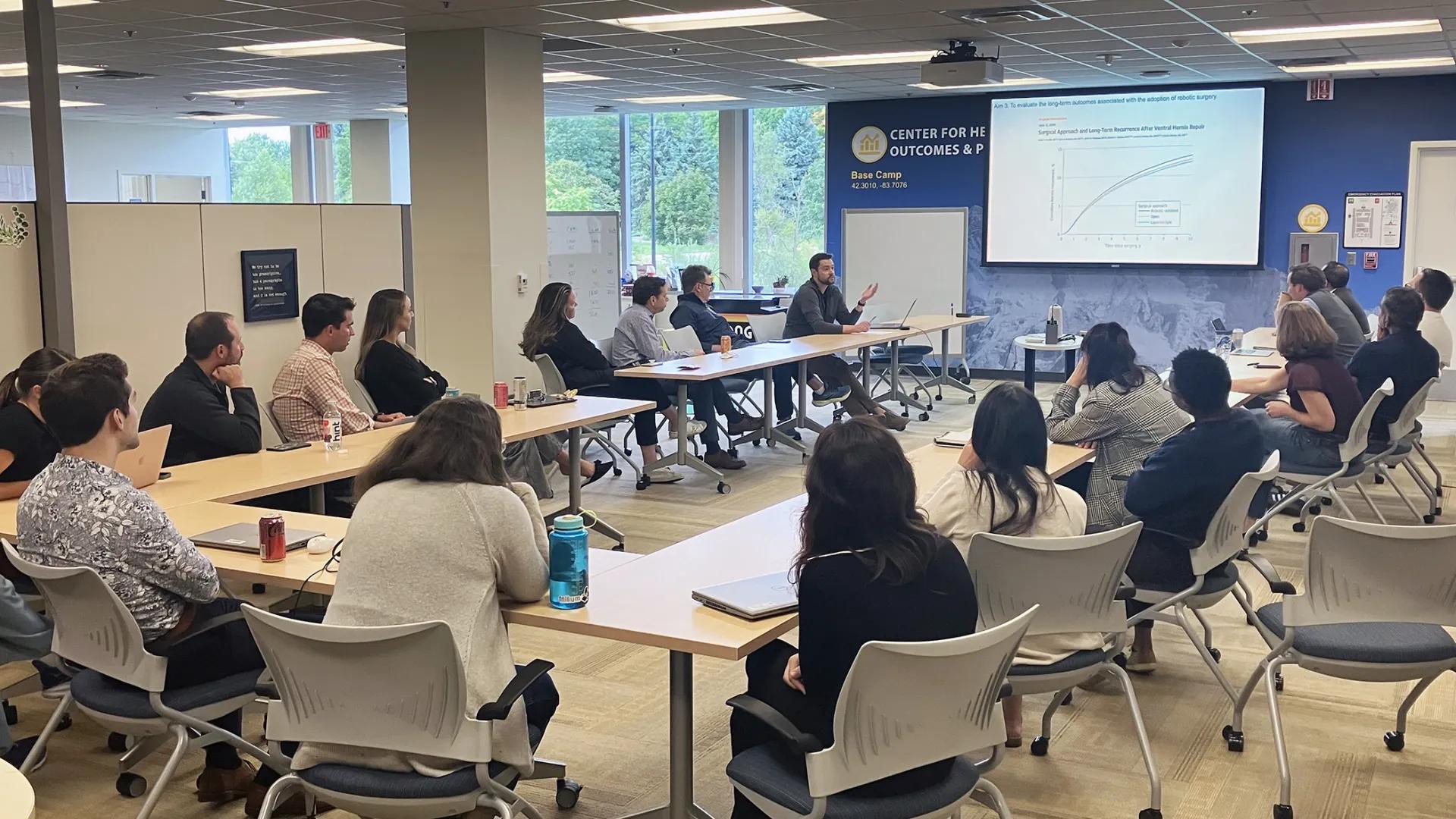 CHOP members discussing a presentation