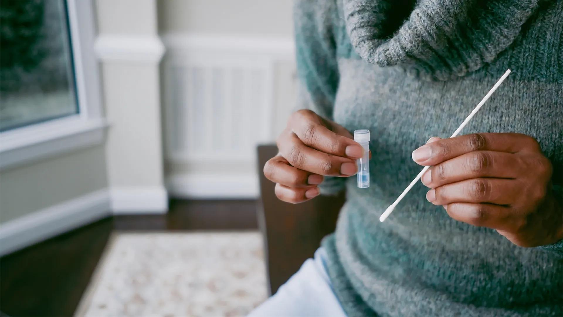 close-up of woman taking swab test
